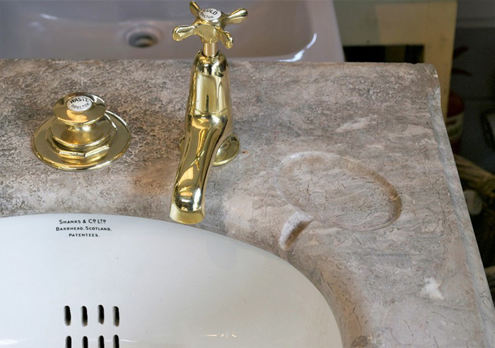 Limestone basin with Royal Doulton taps/mongersofhingham.co.uk